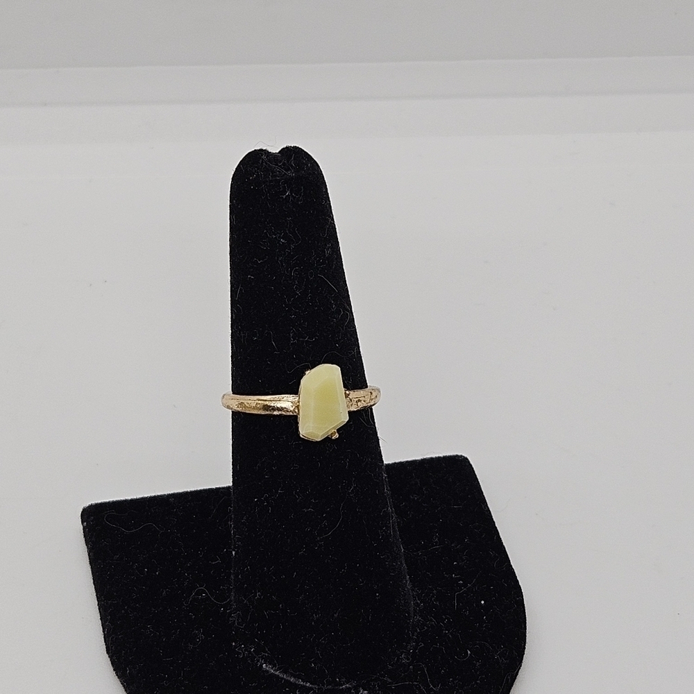 gold tone ring with light yellow faux stone size 6.5